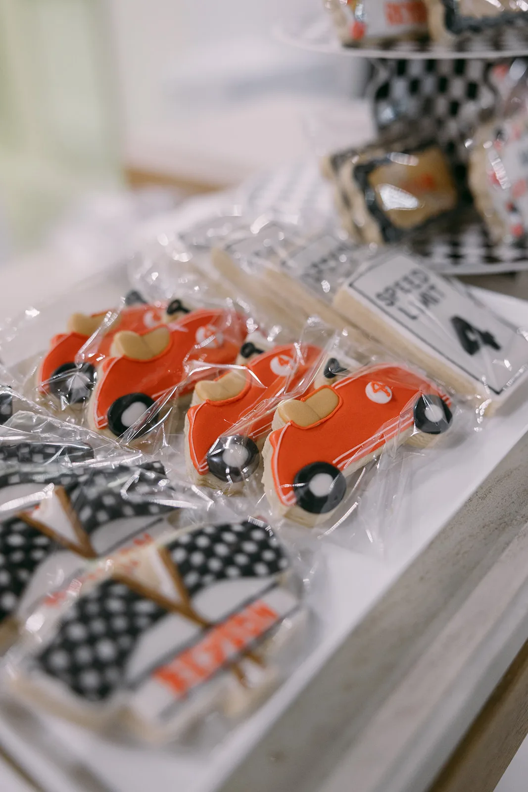 Custom racecar themed cookies for a kids birthday party at Aramas Events
