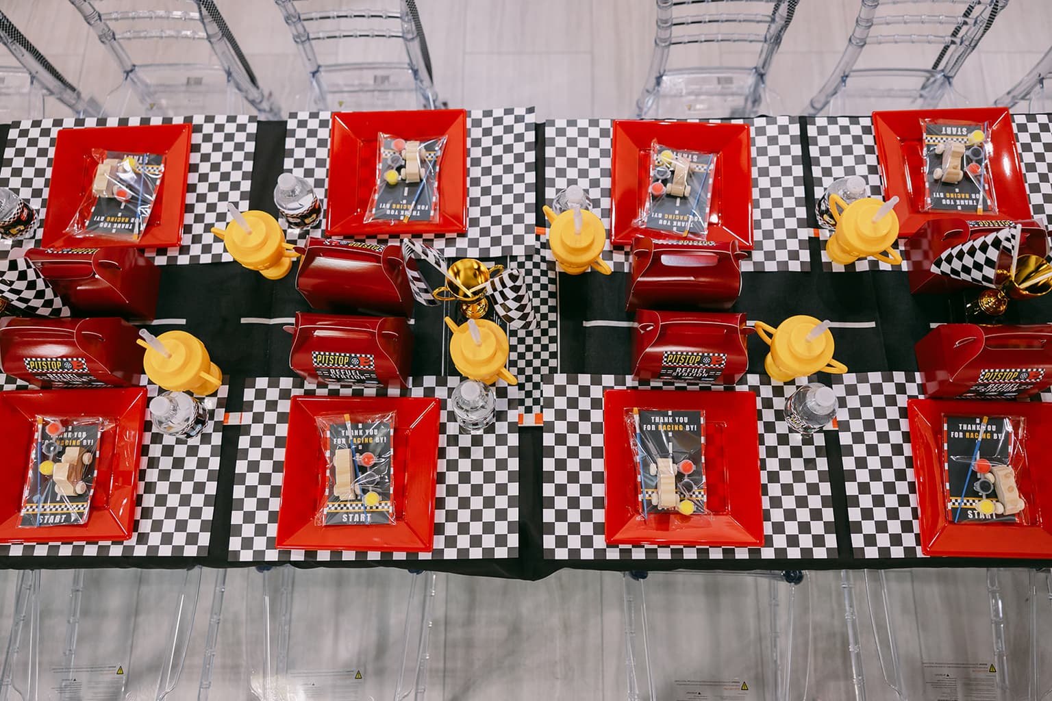 Racecar themed kids birthday party details with table decor at Aramas Events