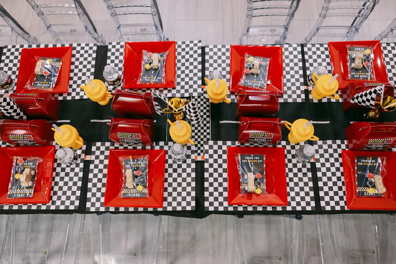 Racecar themed kids birthday party details with table decor at Aramas Events