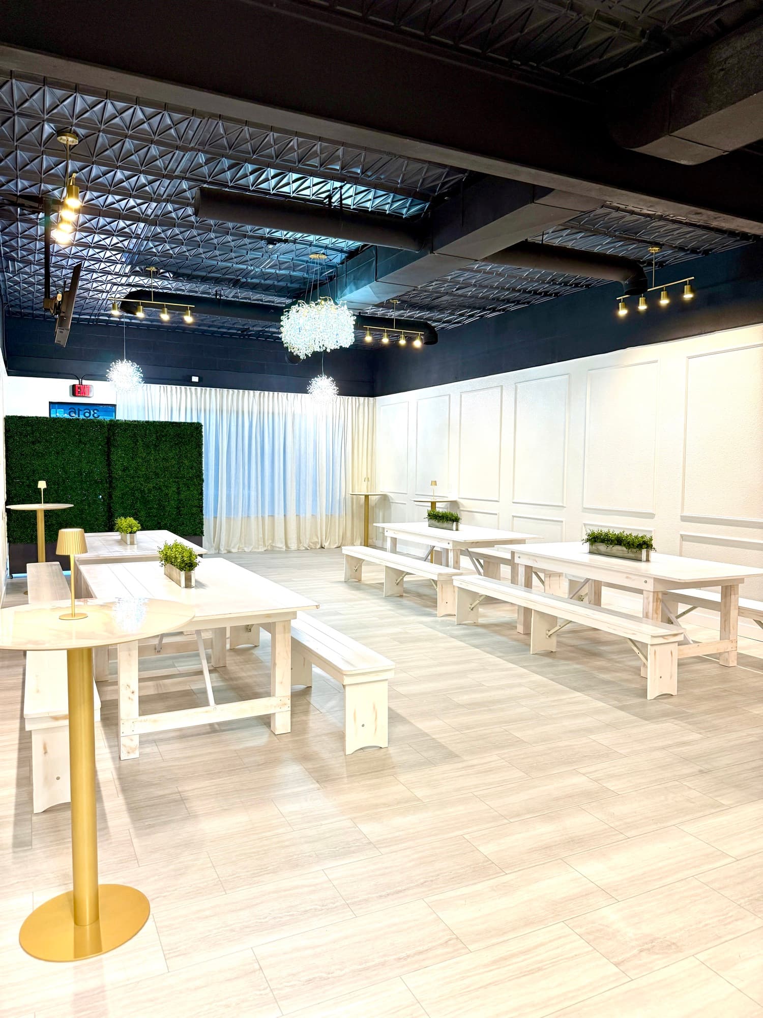 White bench room layout and seating setup at Aramas Events venue
