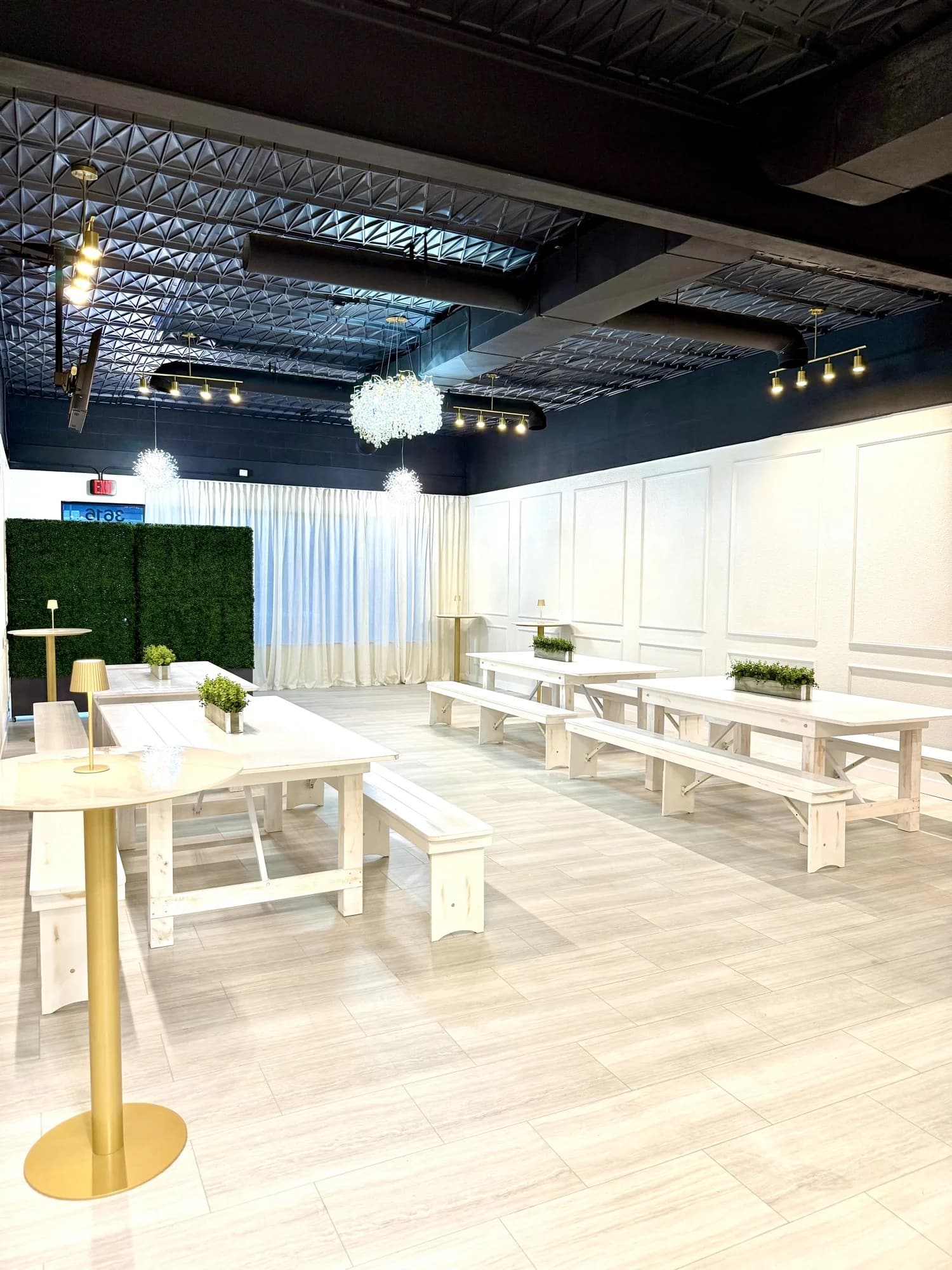 White bench room layout and seating setup at Aramas Events venue